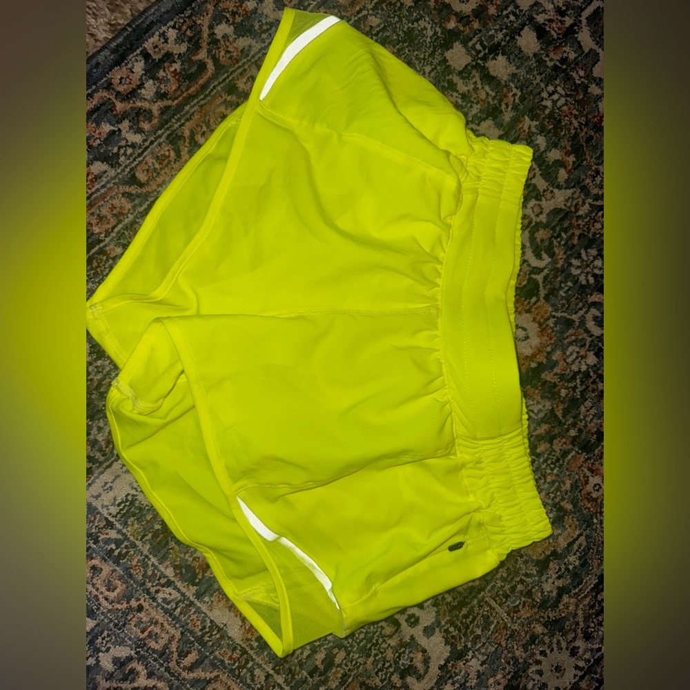 Lululemon shorts, size 6, never worn. Lime green/yellow